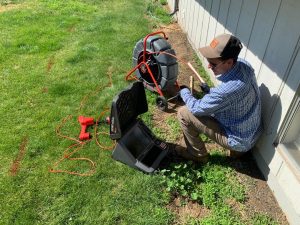 Sewer camera technician performs sewer scope inspection for residential customer. Image courtesy Inland Trenchless Inc.