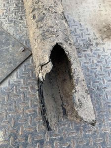 Piece of Orangeburg pipe pulled from residential yard in Spokane Washington in 2023. Image provided by Inland Trenchless Inc.